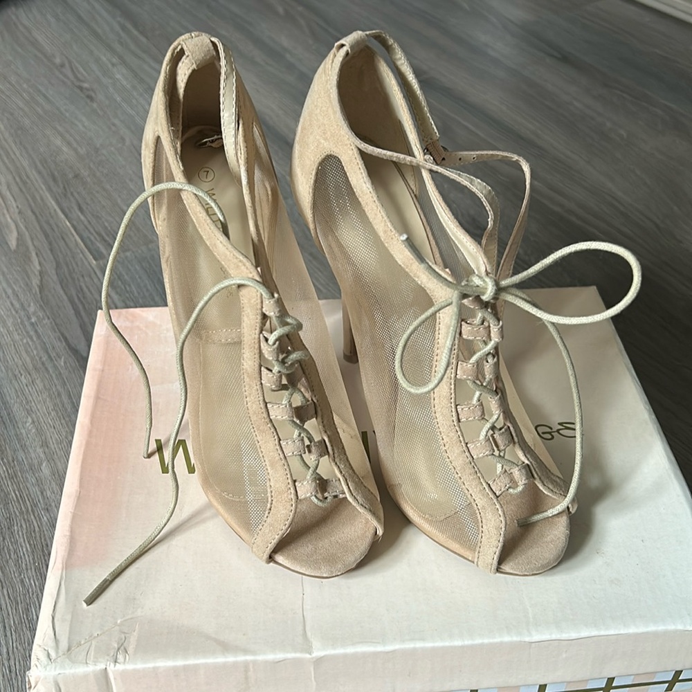 Natural (beige) suede and mesh high heels. Brand new never worn only tried on.